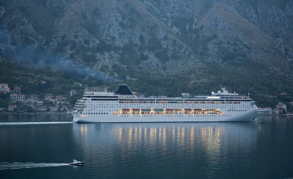 Big cruiser leaving Kotor, Montenegro early in the evening.