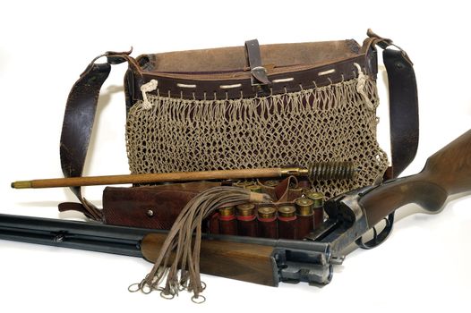 shotgun and its cartridges. Still life representing hunting.