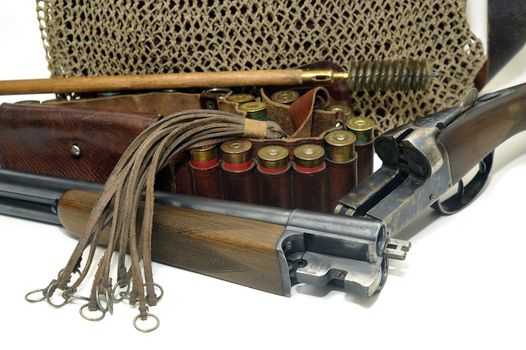 shotgun and its cartridges. Still life representing hunting.