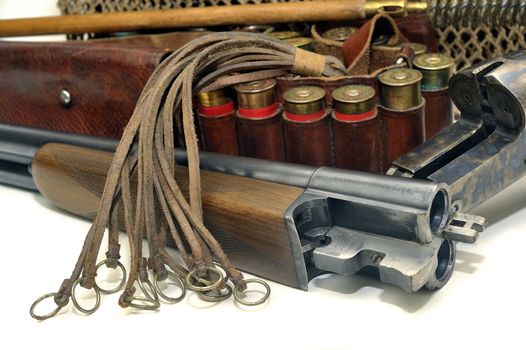 shotgun and its cartridges. Still life representing hunting.