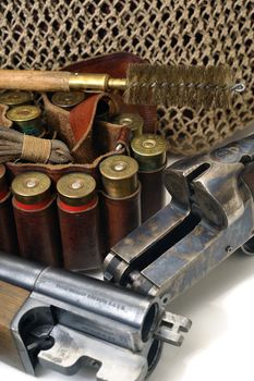 shotgun and its cartridges. Still life representing hunting.