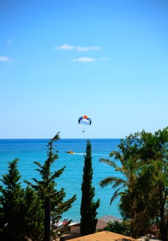 A summer sport - parasailing and boat