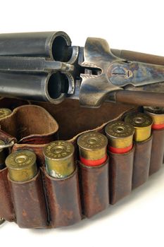 shotgun and its cartridges. Still life representing hunting.