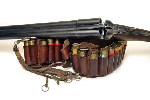 shotgun and its cartridges. Still life representing hunting.