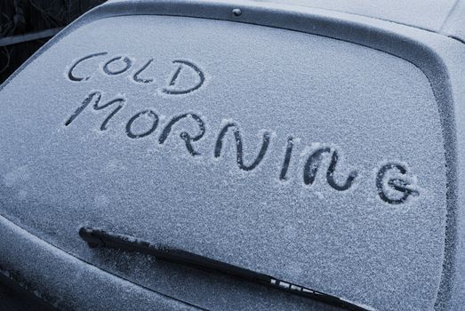 Cold morning written on rear windscreen of an automobile in Denmark.
