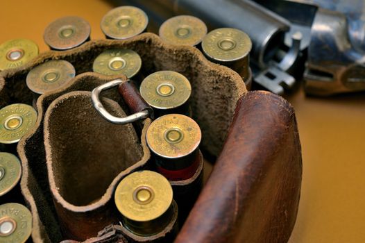 shotgun and its cartridges. Still life representing hunting.