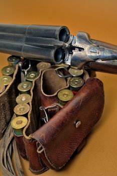 shotgun and its cartridges. Still life representing hunting.