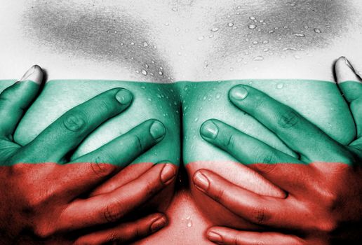 Sweaty upper part of female body, hands covering breasts, flag of Bulgaria