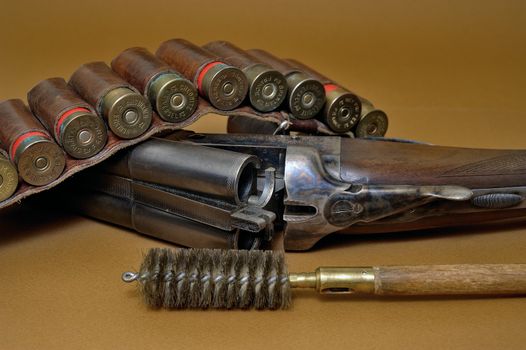 shotgun and its cartridges. Still life representing hunting.