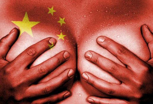 Sweaty upper part of female body, hands covering breasts, flag of China