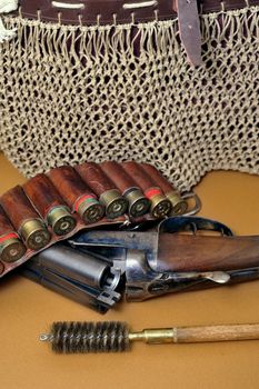 shotgun and its cartridges. Still life representing hunting.