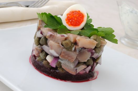 Herring tartare with capers and dill cream sauce