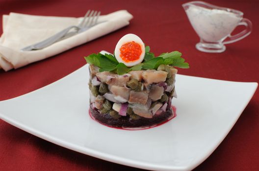 Herring tartare with capers and dill cream sauce