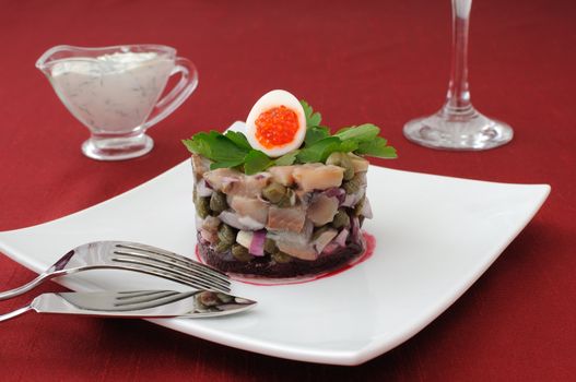 Herring tartare with capers and dill cream sauce