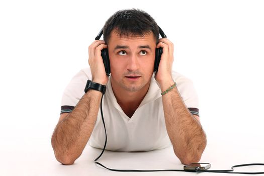 Young handsome man with headphones isolated over white background