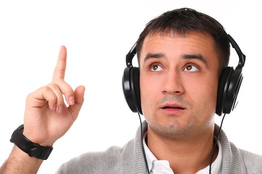 Young handsome man with headphones isolated over white background