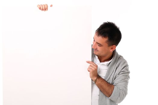 Young handsome man with board isolated over white background