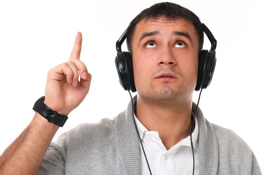 Young handsome man with headphones isolated over white background