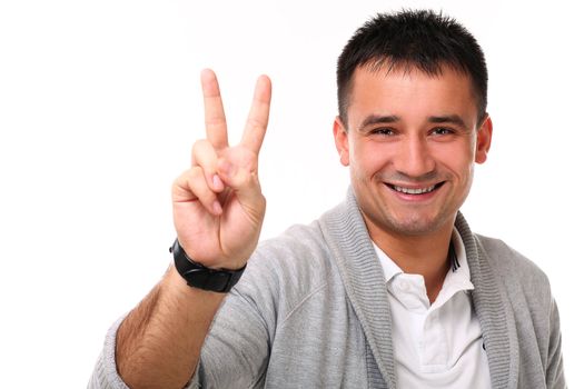 Young handsome man isolated over white background