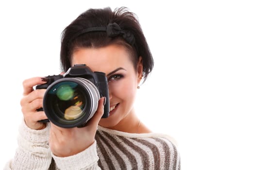 Young happy woman with camera isolated over white background