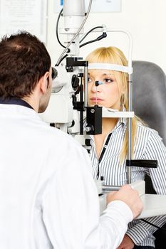 Eye doctor performing an eye examination