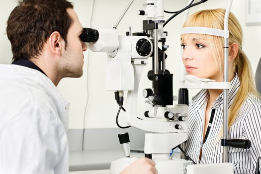 Eye doctor performing an eye examination