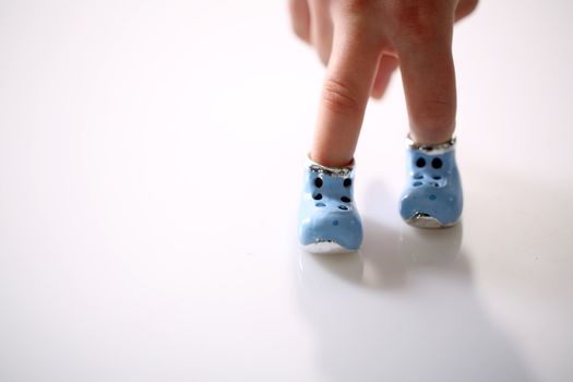 Small shoes on the white background