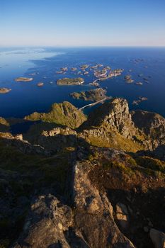 Scenic town of Henningsvaer on Lofoten islands in Norway with bridges connecting rocky islands