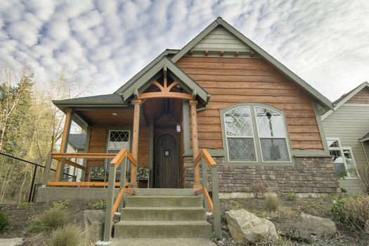 Bungalow House with Front Covered Porch Stair Steps and Landscaping