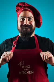 hppy bearded chubby chef on grey background