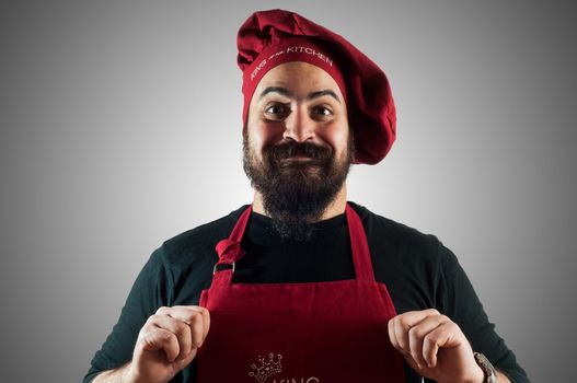 hppy bearded chubby chef on grey background