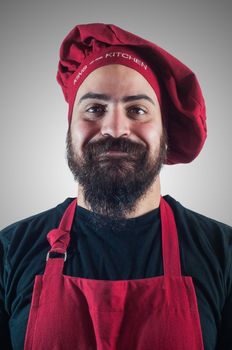 hppy bearded chubby chef on grey background
