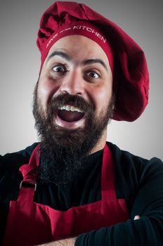 hppy bearded chubby chef on grey background