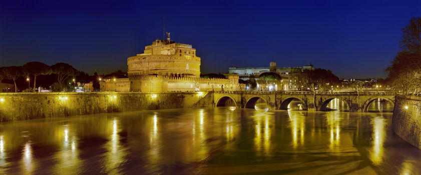 Bridge, castel Sant'angelo and Tiber river at dawn