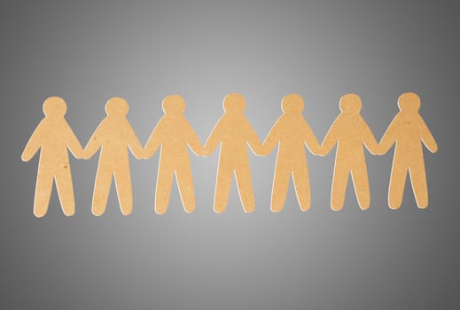 team of paper people on grey background