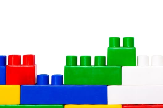 colorful plastic toys isolated on white background