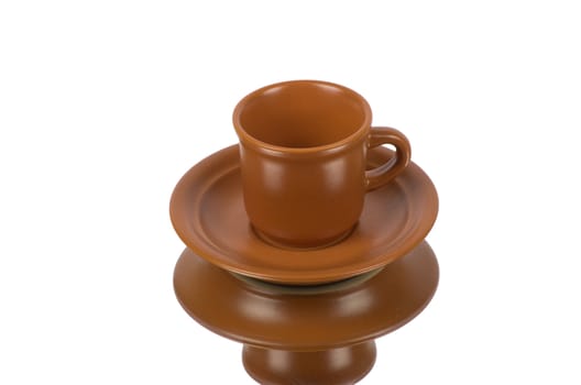 Brown cup on the white background