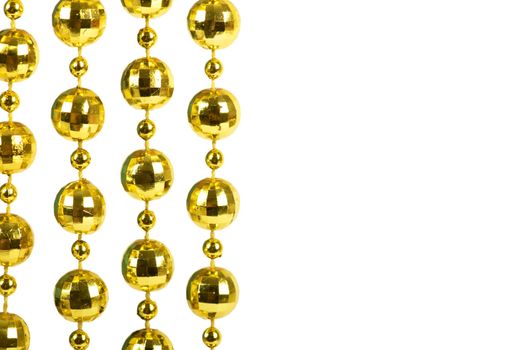 Background made of a brilliant celebratory beads of golden color