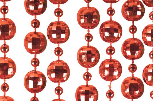 Background made of a brilliant celebratory beads of red color
