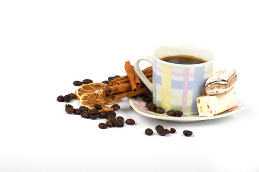 Cup of coffee with ingredients on a white background