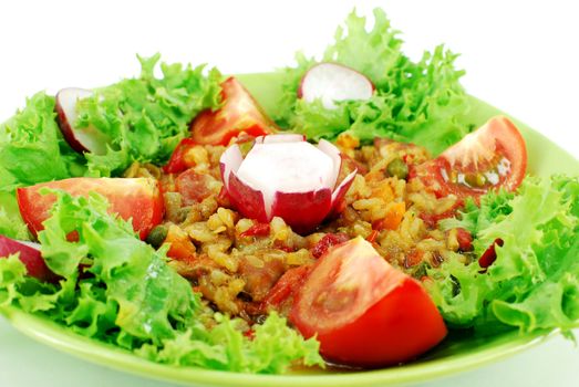 Stew and vegetables with salad