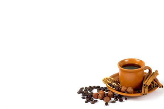 Cup of coffee with ingredients on a white background