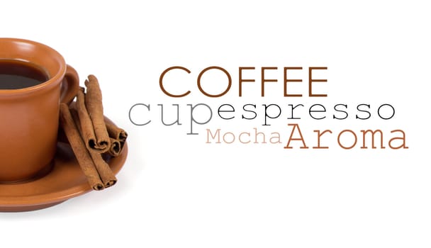 Closeup shot of freshly prepared cup of italian espresso with cinnamon and candy over white background