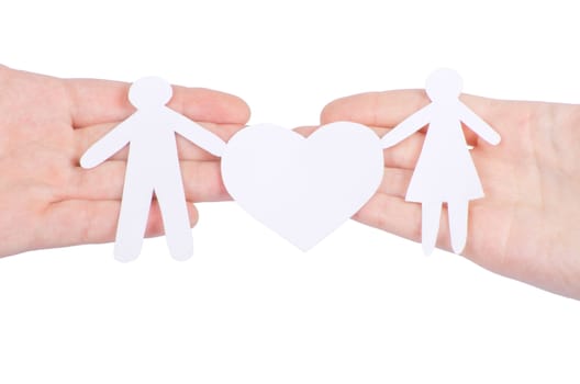 Paper family in hand with a big hearth isolated on white