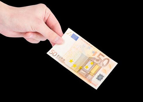 Money (Euro) in a hand isolated on black