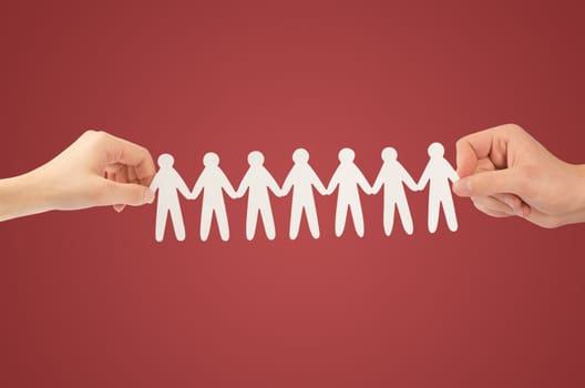 paper people in hands(man and woman)