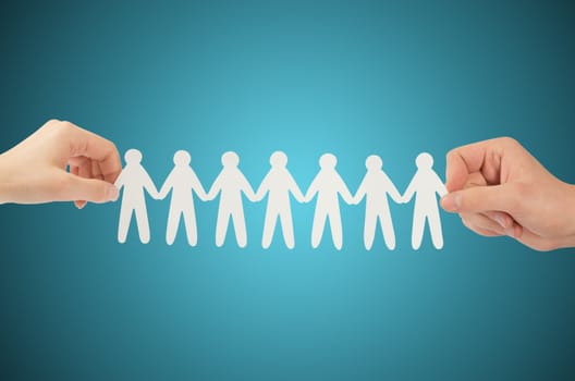 paper people in hands(man and woman)