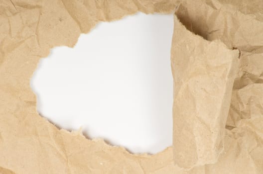 ripped white paper against a white background