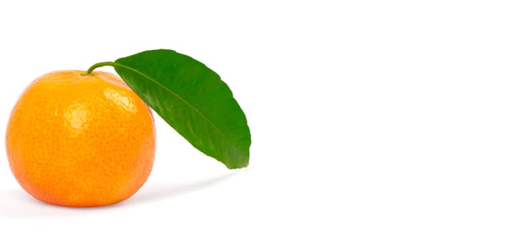Tangerine with green leaves isolated on white