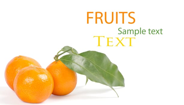 Tangerines with green leaves isolated on white